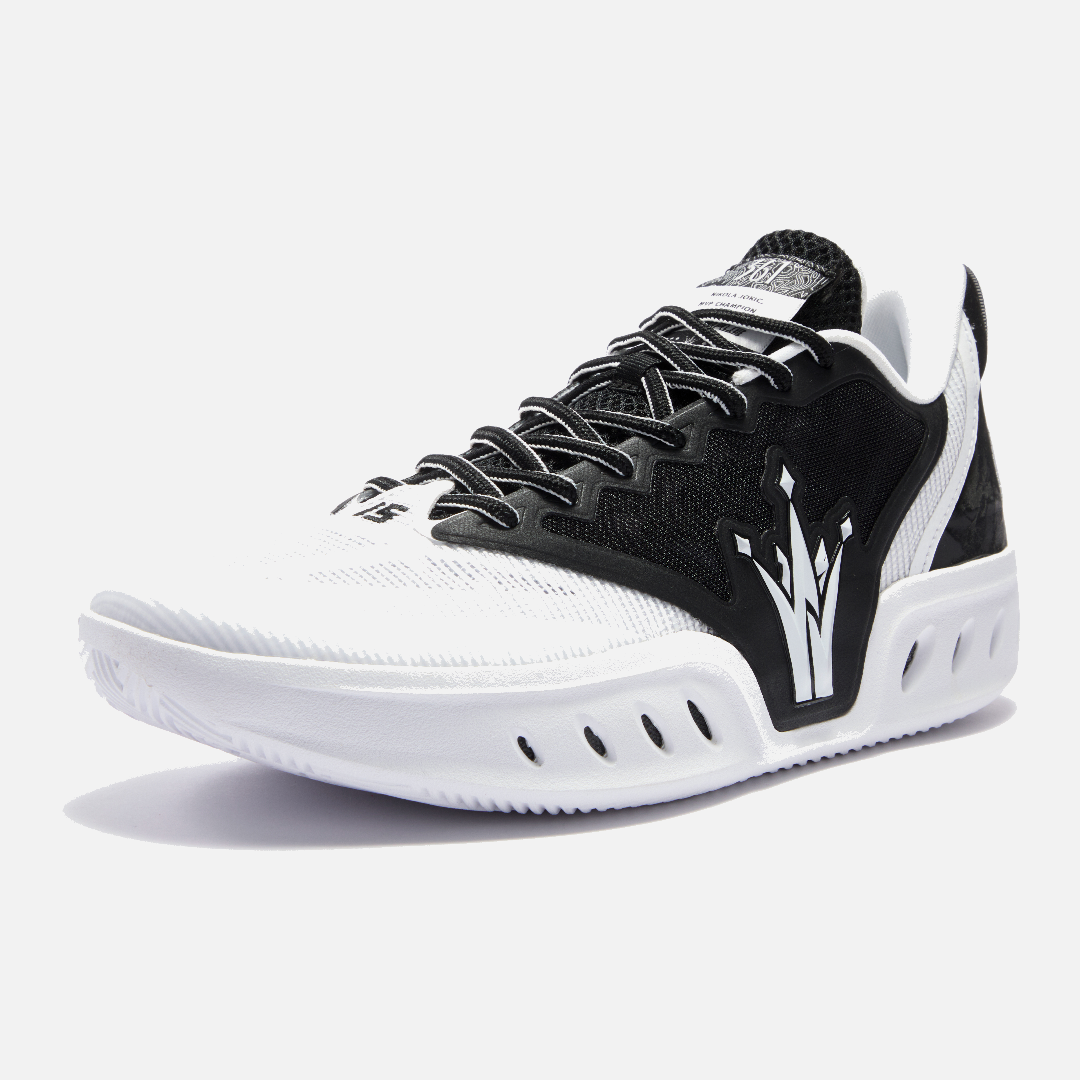 Black and white athletic shoe on a light gray background