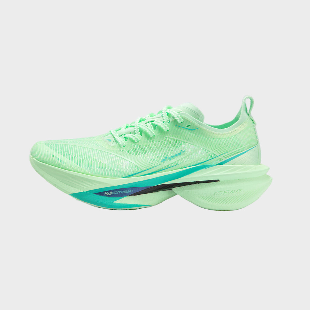 Neon green running shoe on a gray background