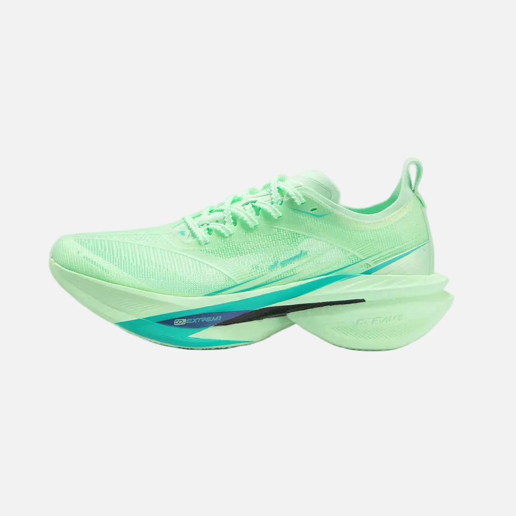 Neon green running shoe on a gray background