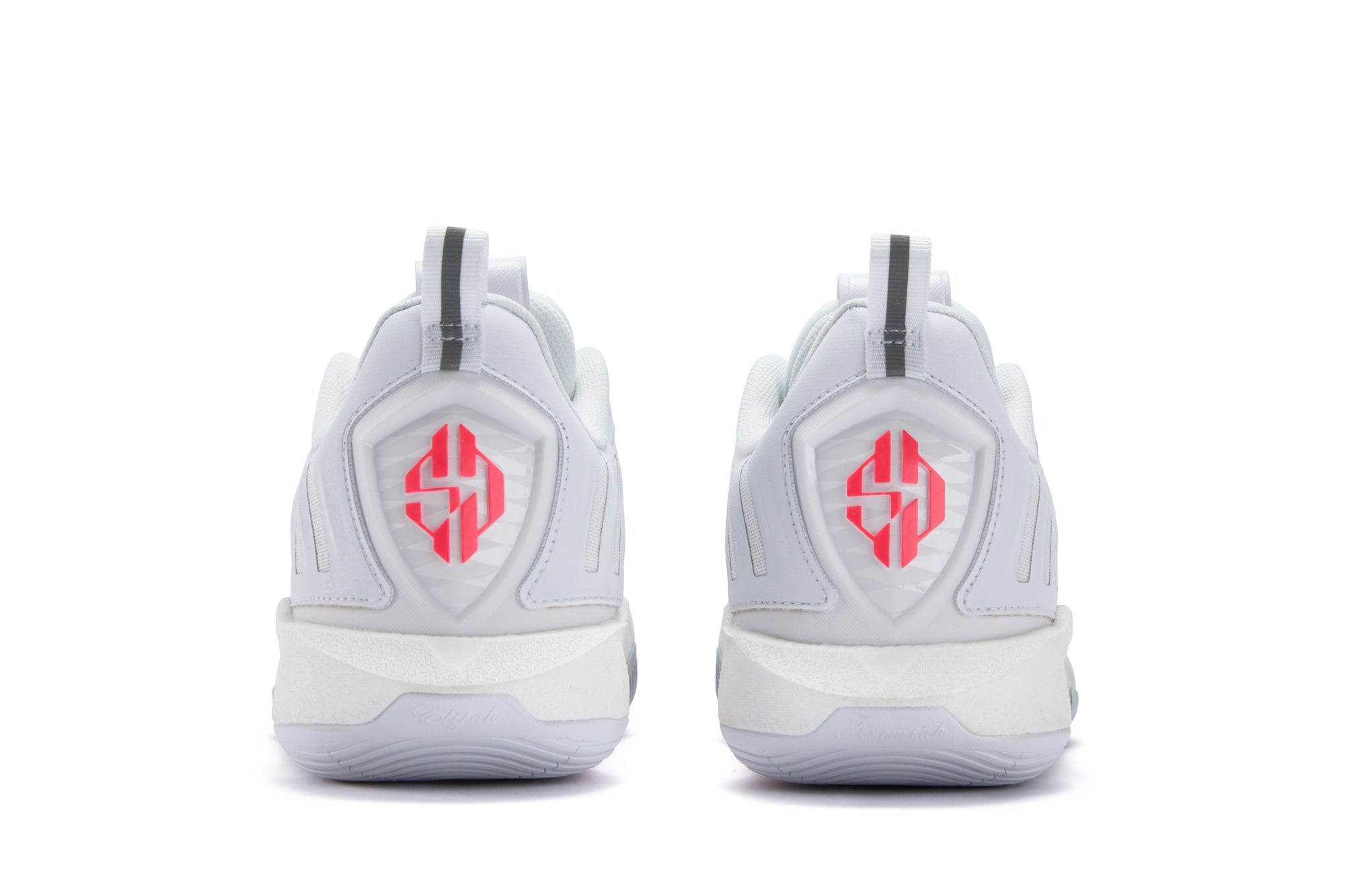 White sneakers with a red logo on a white background