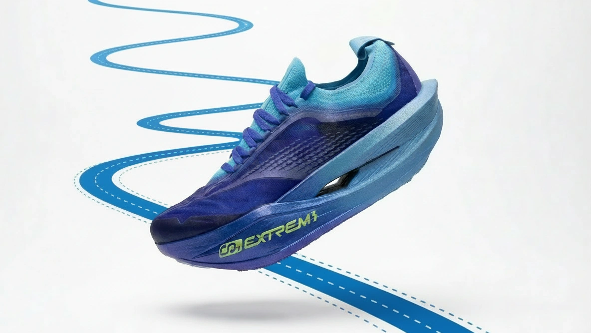 Blue running shoe with 'EXTREME' branding on a white background